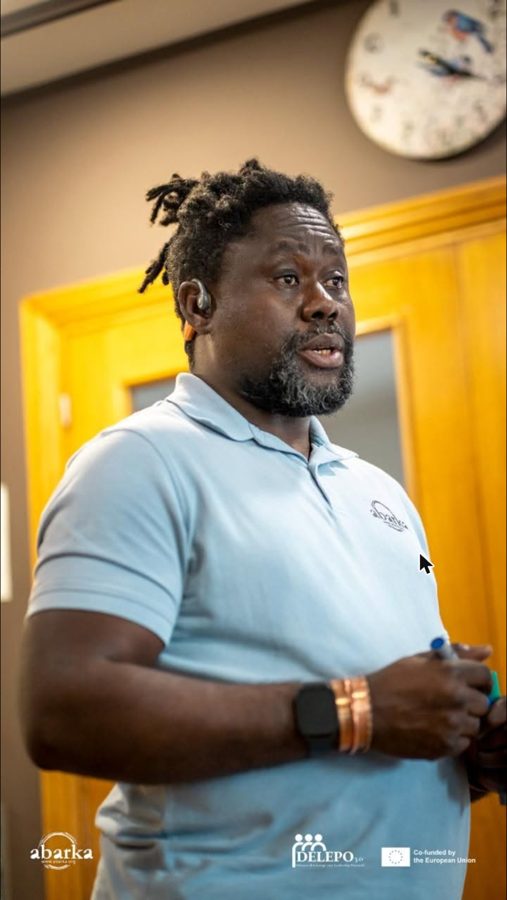 Clotaire speaking during a training session